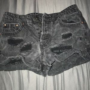 Black ripped shorts